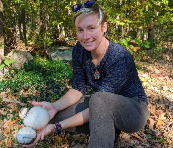 IMG_20191018_155404~2 a woman holding puffball mushrooms